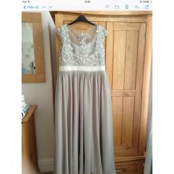 Size 14 bridesmaid dress Taylor made. Silver faith shoes size 4