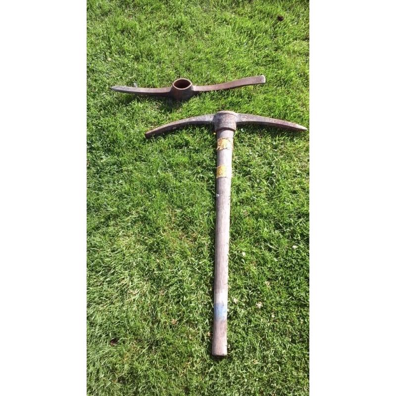Pick and pick shaft with spare head