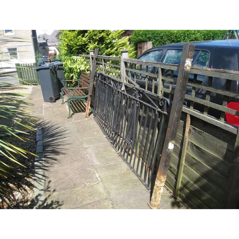 a pair of garden wrought iron gates