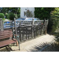 a pair of garden wrought iron gates