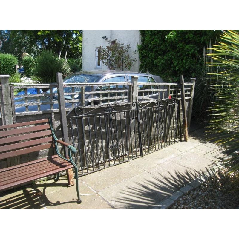 a pair of garden wrought iron gates