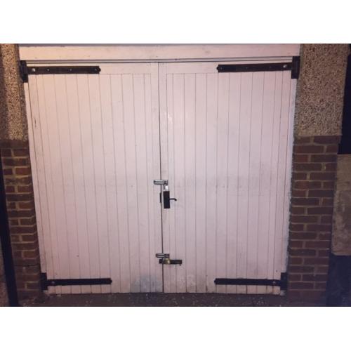White garage doors and hinges