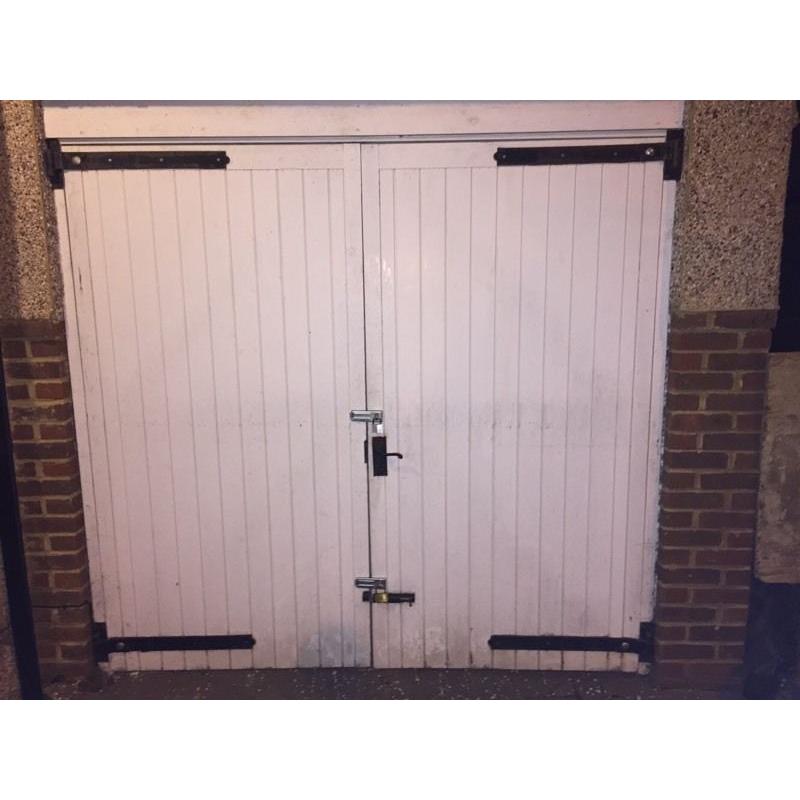 White garage doors and hinges