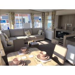 pay no site fees until 2018 on this stunning new caravan in Borth in mid-Wales,