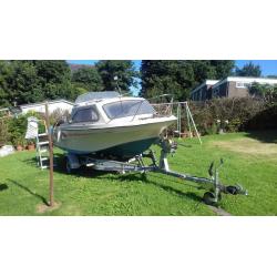 shetland 18f boat 60hp , 1 year old trailer, ready for water r