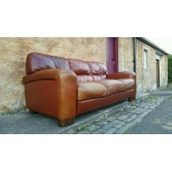 Italian brown leather couch sofa. Pub. Cafe. Restaurant. Industrial look