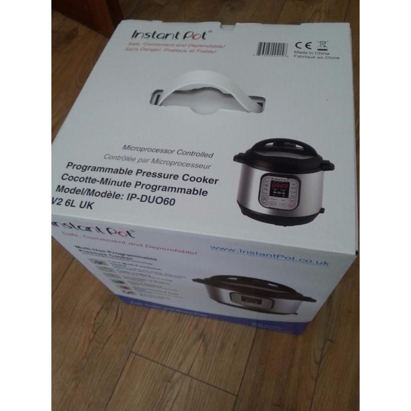 Brand New Instant Pot Duo 7-in-1 Electric Pressure Cooker, 6 Litre, 1000 W
