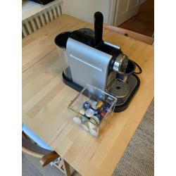 Nespresso Citiz Coffee machine with Nespresso capsule box, capsules, and capsule recycler