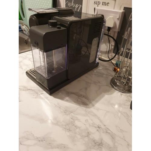 De'Longhi Nespresso Coffee Machine with milk frother.
