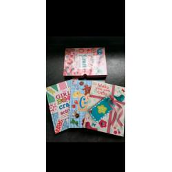 Set of 3 books in case