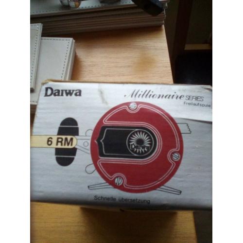 Daiwa Millionaire series fishing reel in original box with extras