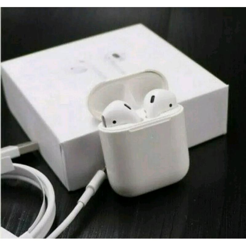 White Wireless - InEar headphones with USB Ca