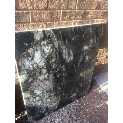 Two stunning Belvedere quartzite slabs / fireplace hearth and back panel.