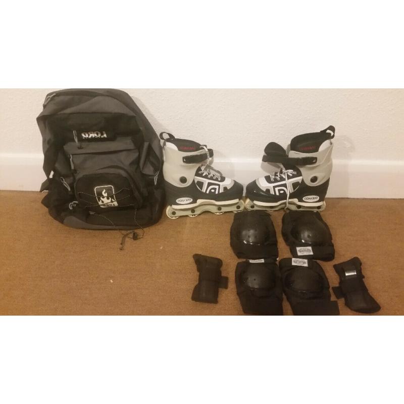 Size 7-Anarchy Combat Roller Blades (with pads and bag)