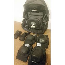 Size 7-Anarchy Combat Roller Blades (with pads and bag)