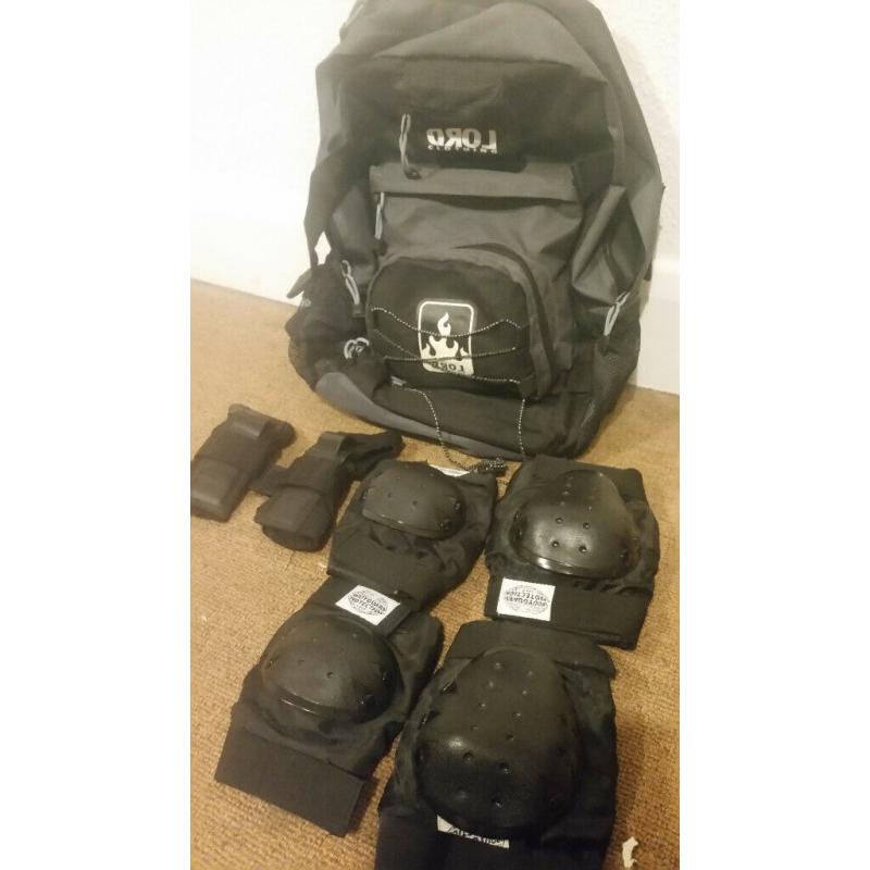 Size 7-Anarchy Combat Roller Blades (with pads and bag)