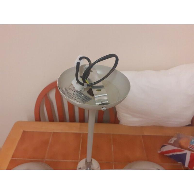 Used grey ceiling light