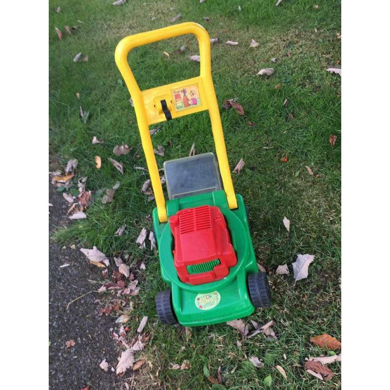 Child?s toy gardening set (mower/barrow/can)