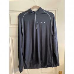 Oakley Golf Top Medium, never been worn